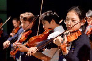 Fieldstone Private School, Toronto - Students playing on violins